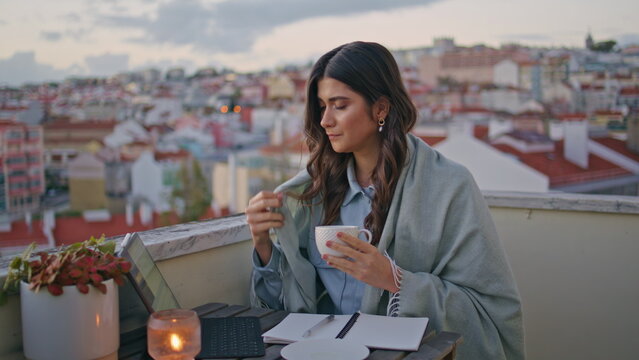 Serious businesswoman working cityscape balcony closeup. Lady typing computer