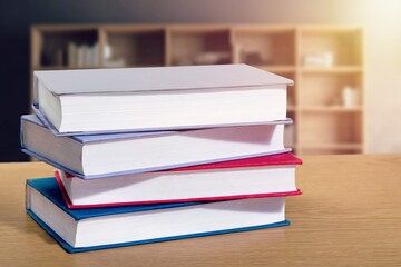 stack of reading books at library background