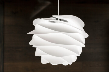 Close-Up Of Artistic White Pendant Light Fixture With Sophisticated Design