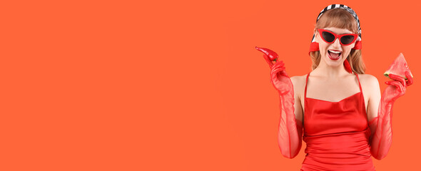 Young woman with fresh watermelon and chili pepper on red background