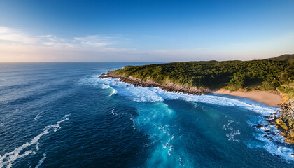 Aerial drone camera capturing a coastal line