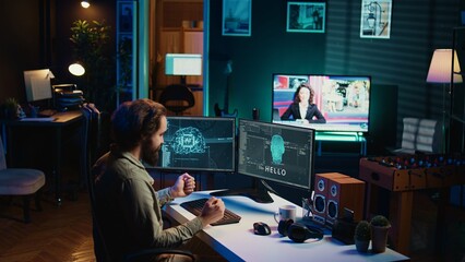 Programmer being asked existential questions by awaken AI gaining consciousness, emulating humans, becoming self aware. Developer speaking with artificial intelligence on PC, camera B