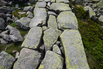 A trail made of stones in the Karkonosze Mountains.