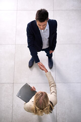 Above, business people and shaking hands with welcome for meeting, greeting and introduction with...
