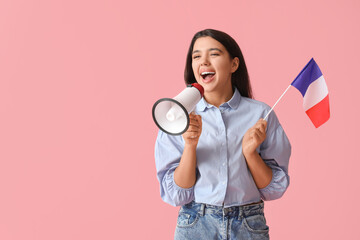 Female French language teacher with megaphone and flag on pink background