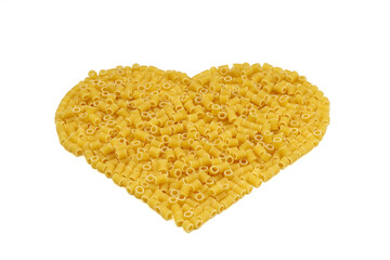 Pasta in the shape of a heart on a white background.