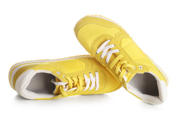 Stylish male yellow sneakers on white background
