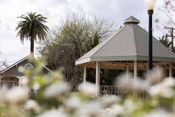 Fillmore, California, USA - March 24, 2024: Afternoon light shines on the civic center plaza kiosk.