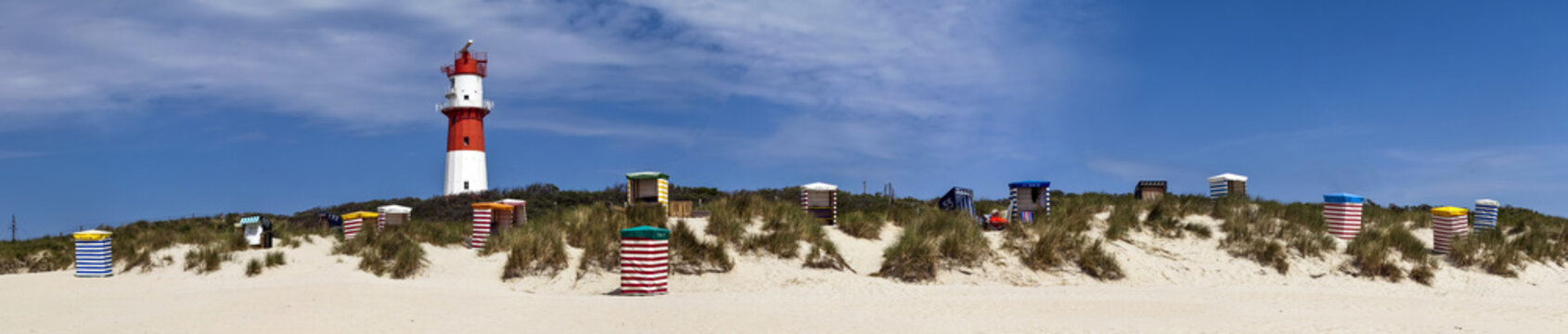 South beach with beach chairs and electric lighthouse, Borkum, Germany, Europe