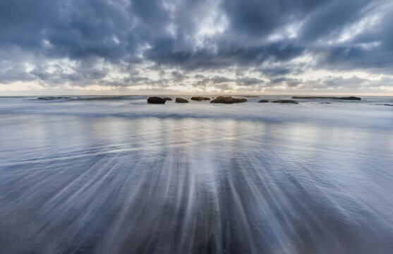 Ebb tide on the beach of Opononi, Far District, North Island New Zealand