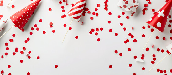 Confetti and Red Decorated Hat on Minimal White Background