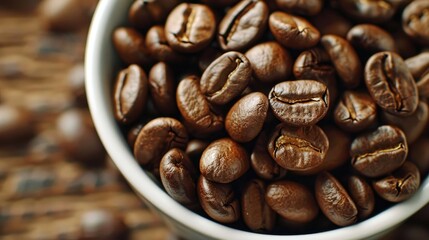 Fototapeta premium Coffee beans are filled with vitality Cup with coffee beans in macro view