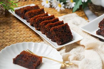 Kek Buah Kukus, a traditional Malaysian steamed fruit cake filled with dried fruits, nuts, and spices