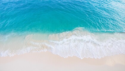 Beautiful tropical summer beach, top view of white sand and blue sea waves, nature background, vacation in paradise concept for tourism, vivid colorful.