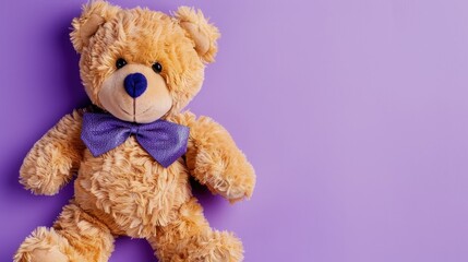 Obraz premium Cute brown and blue teddy bear on purple background with plush pattern Display of toys for children Top view with space for text