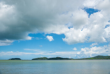 Turquoise ocean sea water white wave splashing deep blue sea. Bird eye view monster wave splash on rock. Tropical sea beach in summer seaside outdoor. Ocean island beautiful dramatic landscape.