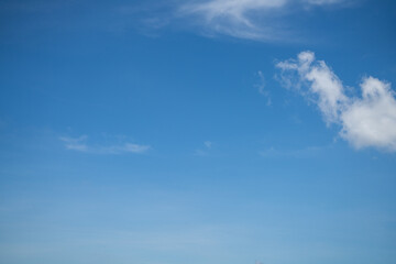 Fototapeta premium Beautiful blue sky and white cumulus clouds abstract background. Cloudscape background. Blue sky and fluffy white clouds on sunny days. Blue sky and daylight. World Ozone Day. Ozone layer. Summer sky.