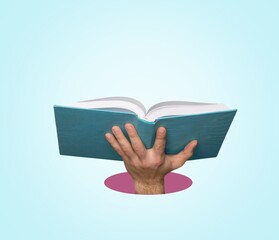 Open book in human hand on background.