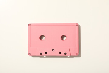 Pink tape recorder on a white background