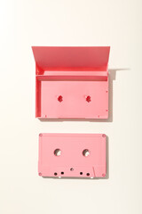 Pink tape recorder on a white background