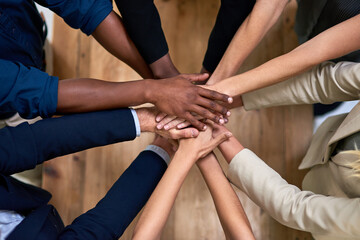 Above, stack or business people with teamwork, hands or cooperation with commitment. Group, closeup or employees with community support, collaboration or diversity with solidarity and professional