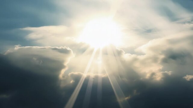 A divine spectacle as the suns powerful rays break through the ominous clouds signaling the beginning of a new day.