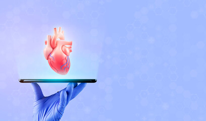 The doctor's hand shows the human heart through a hologram projected from his tablet. Heart...