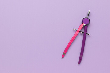 Colorful Geometric Drawing Compass on Purple Background for Artistic and Educational Uses
