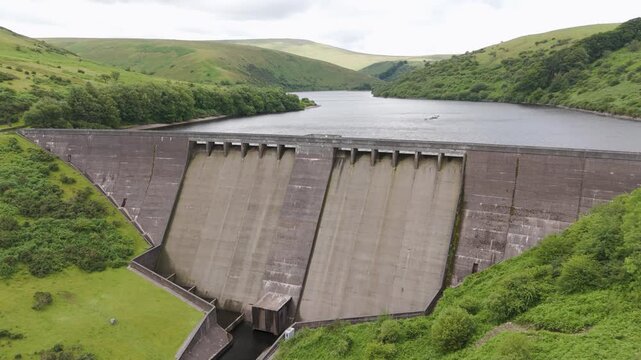Drone orbital view of Meldon Reservoir showcasing natural beauty in Dartmoor National Park, UK