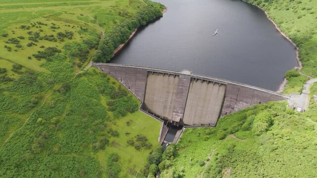 Aerial flyover of Meldon Reservoir in Dartmoor National Park highlighting its expansive natural beauty