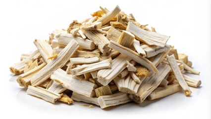 Freshly dried and sliced marshmallow root althaea officinalis in neat pile isolated on clean white studio background with soft focus.