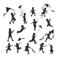 Silhouettes of children playing with kites.