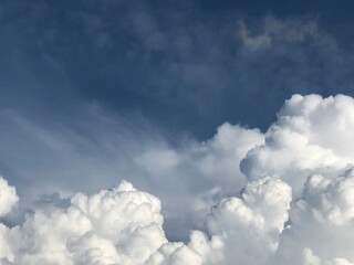 Obraz premium Fluffy White Clouds on Blue Sky Background
