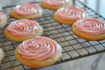 Pink Frosting Swirled on Sugar Cookies