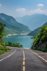 Realistic image of an empty road in front of a mountain view. and blue sea