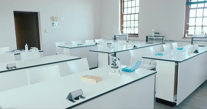 Science, classroom and learning with empty room of laboratory for education, chemistry and technology. Medicine, test and research with interior of school for college, medical and experiment