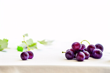 High-Resolution Purple Grapes on Minimalist Background - Ideal Product Background for Food and Beverage Branding and Mockups