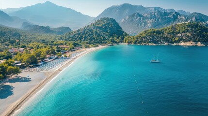 Naklejka premium Aerial View of a Pristine Beach with Turquoise Waters