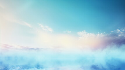 Obraz premium Water fog that rises above the calm lake or river surface under the blue sky. A lake or river scenery filled with water fog.