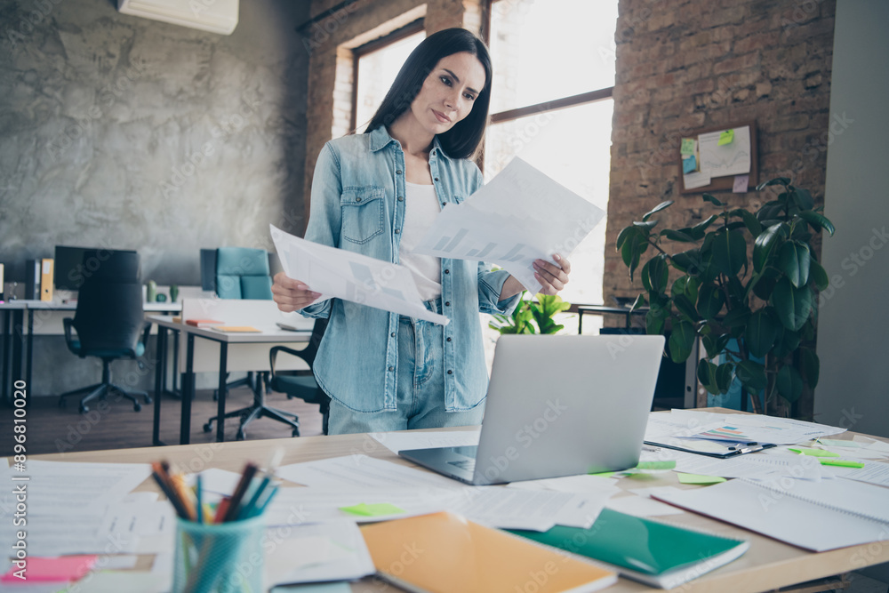 Wall mural photo portrait of pretty young girl write report documents wear trendy denim outfit modern workplace