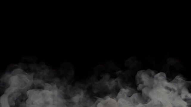 Seamless loop of heavy low hanging smoke in the bottom of the frame, alpha channel for transparency, 4k 24p