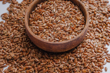brown flax seed in a brown dish