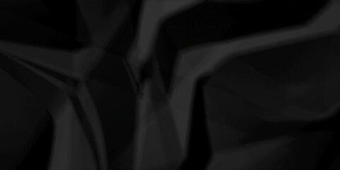 Dark black crumpled old paper background. panorama craft wrinkly paper texture background, crumpled craft ripped poster and banner.	
