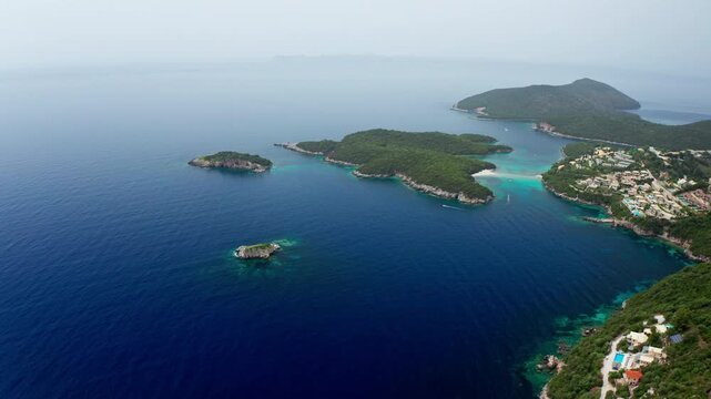 Aerial drone view of the Preveza coastline in the Epirus region in Greece. High view of the exotic Alonaki beach and other small beaches in the distance close to Parga.