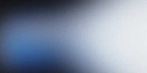 Blue to white abstract grainy background fade
