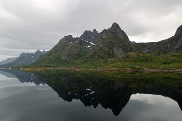 Mountains reflected in the water of the Trollfjord, Norway