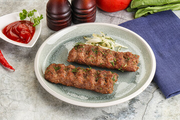 Kebab with beef served onion