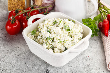 Curd cheese with green herbs © Andrei Starostin