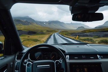 A car drives through scenic land on open roads, showcasing a picturesque journey with expansive landscapes and smooth