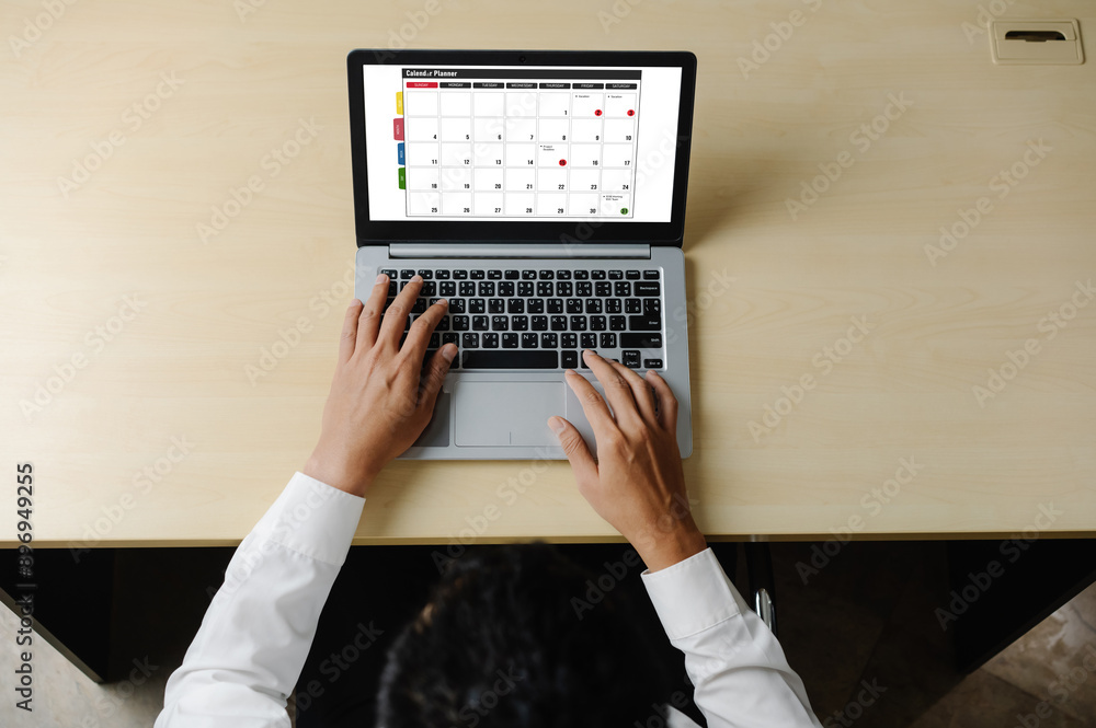 Poster calendar on computer software application for modish schedule planning for personal organizer and on